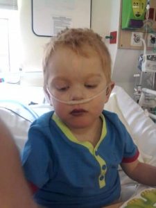 Young boy in hospital for heart surgery.